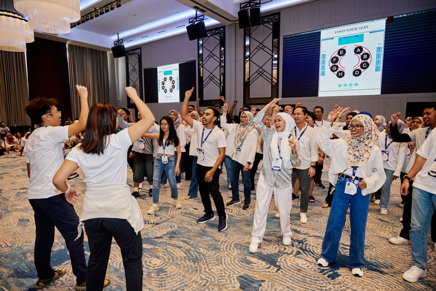 Energised participants cheering during activity