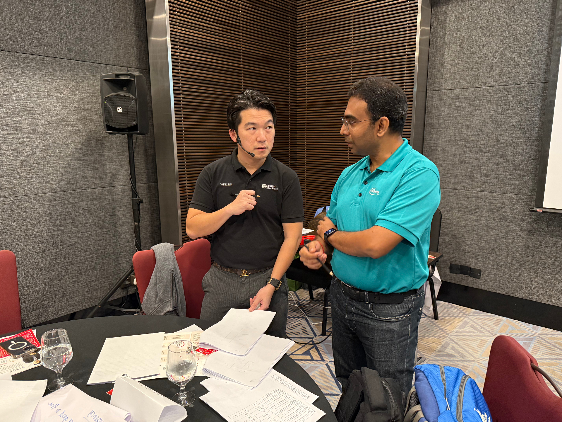 One-to-one coaching discussion during workshop